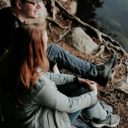 expat-life-blog-photo-of-a-couple-sitting-near-body-of-water